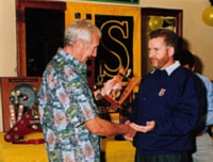 John Sprinzel presents SCCA Associate Championship trophy to Chris Dimmock, Sydney 2000