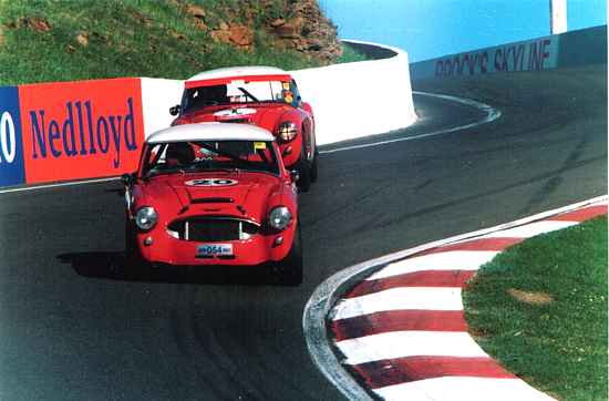 Hopwood's Bathurst experience allows him to pass Welch's Healey over the top of Mt Panorama. Picture by Ross Lawley